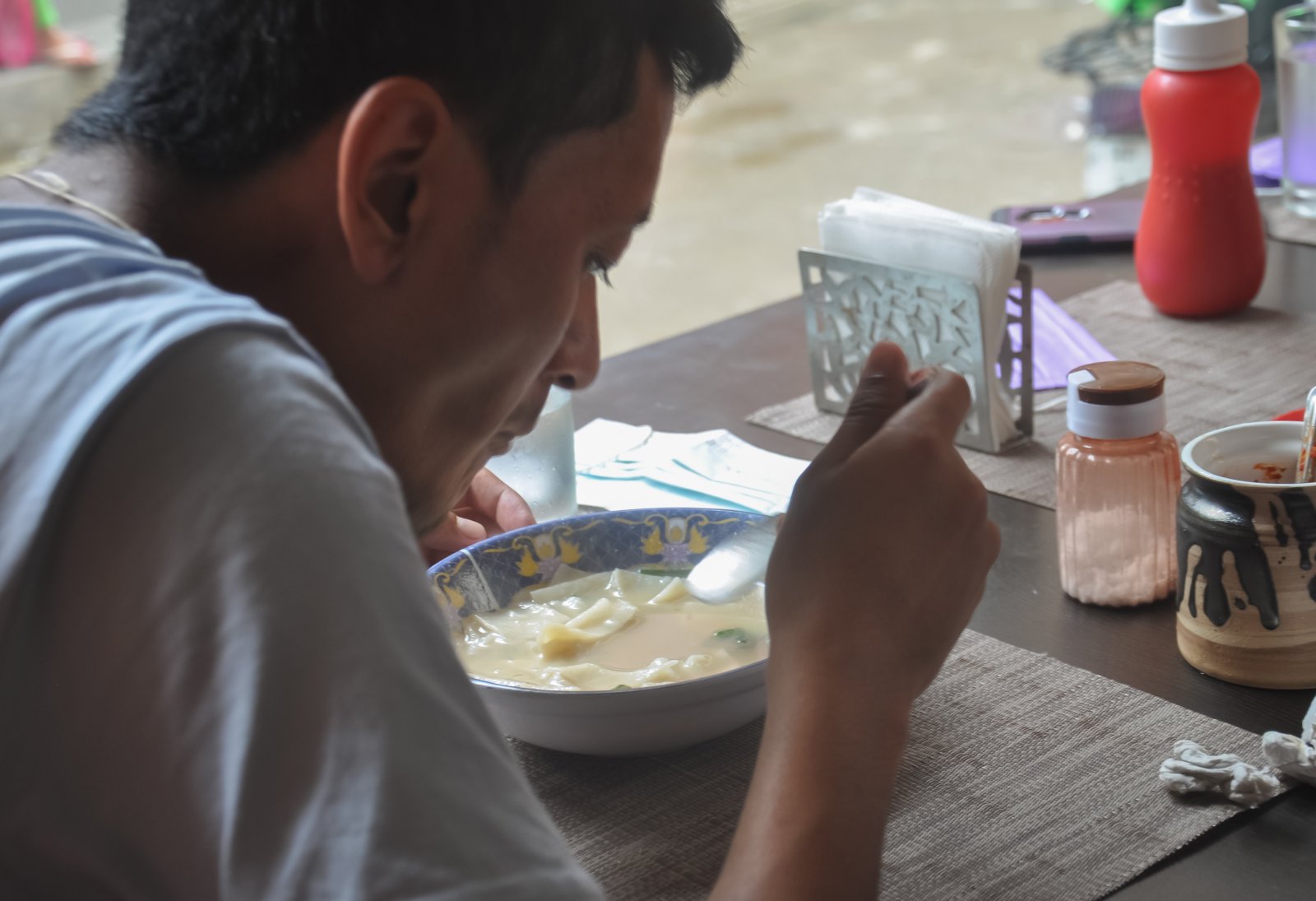 a asian young guy eating thenthuk tibetan cousin 2023 11 27 05 04 53 utc
