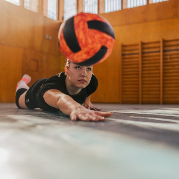 woman playing volleyball in a sports hall and slid 2024 05 10 16 27 15 utc
