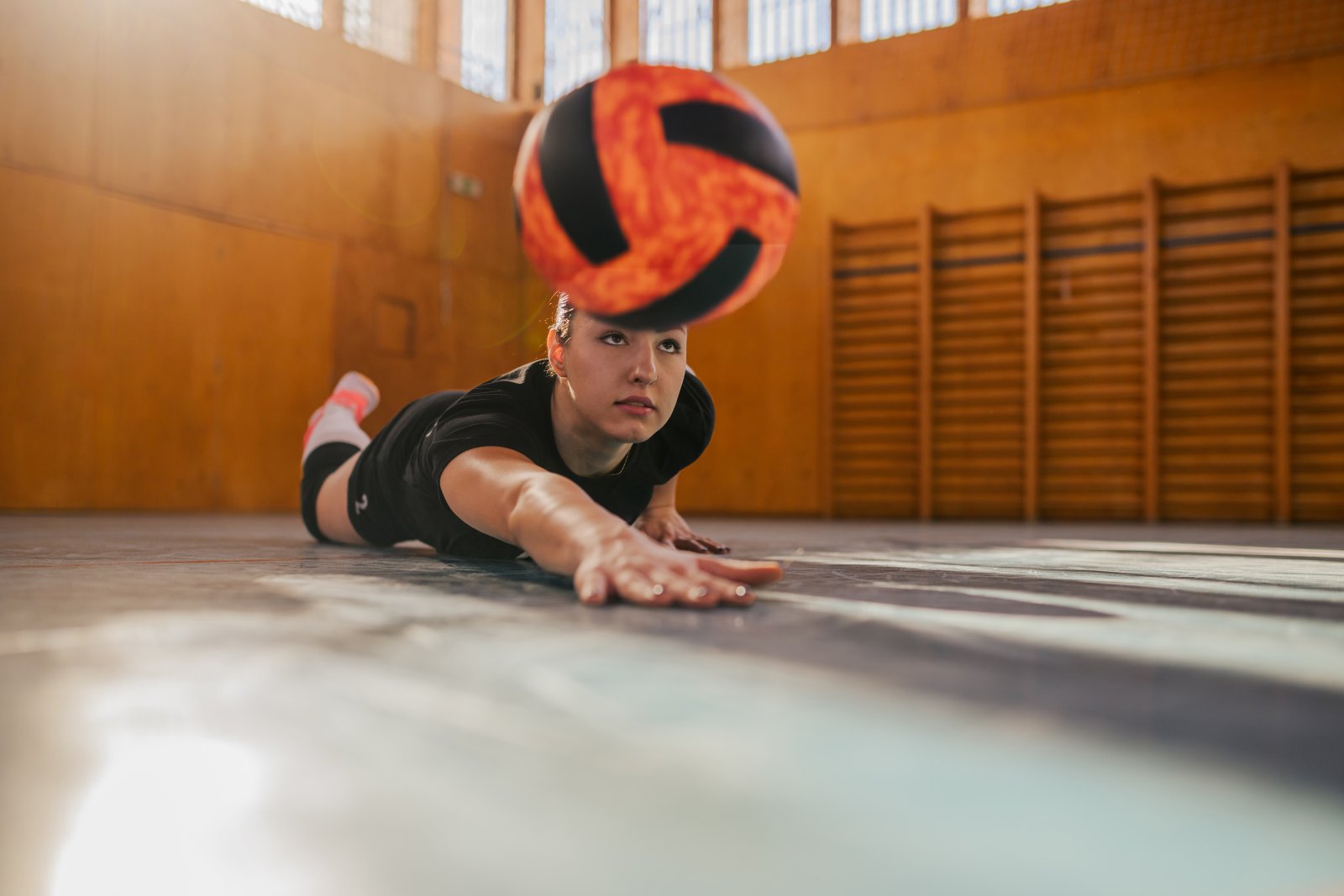 woman playing volleyball in a sports hall and slid 2024 05 10 16 27 15 utc